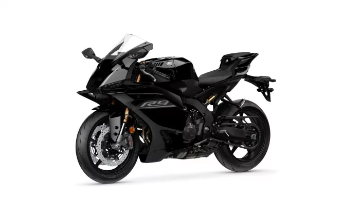 Black Yamaha sport motorcycle photographed from a front-left three-quarter view, showing its aggressive styling and glossy finish.