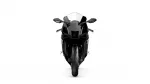 Front view of a black Yamaha sport motorcycle with a tall windscreen and angular fairings.
